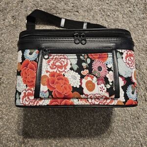 Elegant Floral Cosmetic Bag with Black Accents